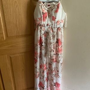 Floral romper with a long trail.